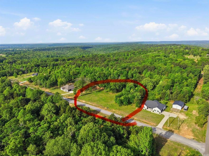 This acre was subdivided and sold off from a larger parcel (778-10989-000). Twin Groves. Faulkner County, AR. Underground utilities on site. This was a nearly ready-to-build lot. Just needed some dirt work and some small trees and shrubs cleared.