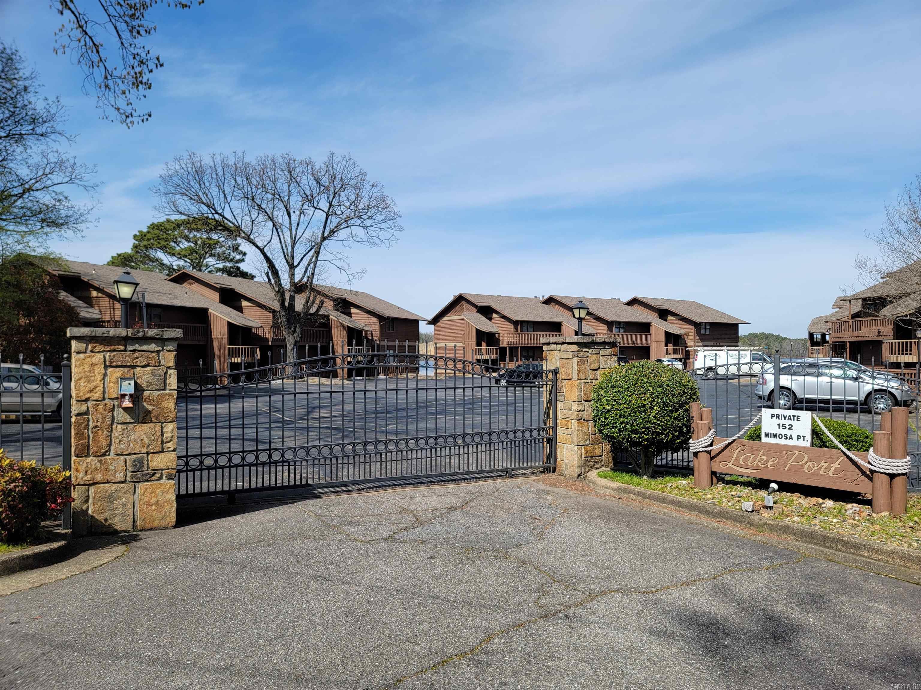 Mimosa Point is kind of a big deal! Welcome to your turnkey lake retreat! This beautifully appointed 2 bedroom, 2 bathroom condo is perched on the 3rd floor with stunning views of Lake Hamiltonās main channel. Offering both comfort and convenience, it comes fully furnished and move-in ready. The kitchen features granite countertops, a stone-faced breakfast bar, stainless steel appliances, and custom cabinetry. The open living area boasts a cozy stone fireplace, wood accents, and access to your private balcony with breathtaking lake viewsāperfect for entertaining or relaxing. Included with the condo is a covered boat slip with lift plus a personal watercraft float, making lake days effortless. Recent updates include a new HVAC system (2022), ensuring year-round comfort. Whether youāre looking for a primary residence, vacation getaway, or investment property, this condo offers it allāmodern style, unbeatable lake access, and one of the best views on Lake Hamilton. No long term or short term rental allowed.