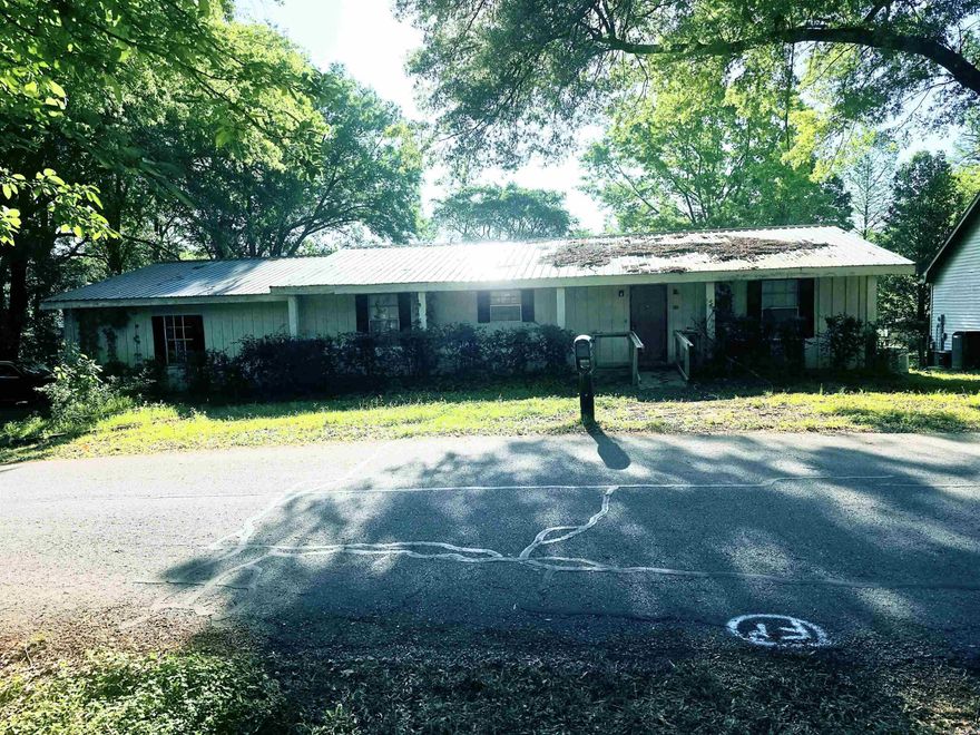 Nestled on a tranquil cove of Lake Conway, the charming home at 16 Roberts Drive invites dreams of lakeside living. This 1,770 square-foot haven features three cozy bedrooms and two baths, perfect for families or weekend getaways. Imagine waking up to the gentle sounds of nature, surrounded by tree-covered grounds on a level .79 acre lot, fully chain-link fenced for privacy.  As you step outside, a covered patio extends your living space into the lush outdoors, where summer afternoons blend seamlessly into sunset gatherings. The boathouse, complete with two slips, promises endless adventures on the water, and a dedicated storage shop building provides room for all your outdoor gear.  A Generac power backup ensures peace of mind through storms or power outages. The sellers, motivated to find the right buyer, reflect the warmth of this community. At 16 Roberts Drive, life is not just about a home; it’s about the promise of new memories by the lake, where every day feels like a vacation.