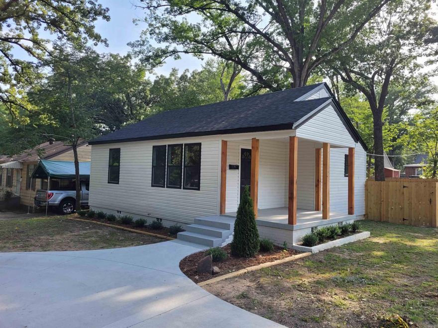 Completely updated/remodeled 3-bedroom 2 bath with large walk-in closet in the master. Brand new roof. Original Hardwood Floors with luxury planking in master and tile in the kitchen and baths, brand new kitchen with New Stainless-Steel Appliances. Natural Stone Countertops with separate dining area. Modern designed bathrooms with floating vanity in the master. Freshly painted interior. New roof & New concrete circle driveway that matches perfectly with nice corner lot, Newer Central Heat/Air Unit with new duct work. Large backyard with new 6 Foot Privacy Fence. The backyard has a New Deck and a separate extra-large parking pad with space for up to a very large Truck/SUV in the fenced in backyard. The freshly planted very low maintenance evergreens and the overall modern design truly sets the home apart from all others in the area.