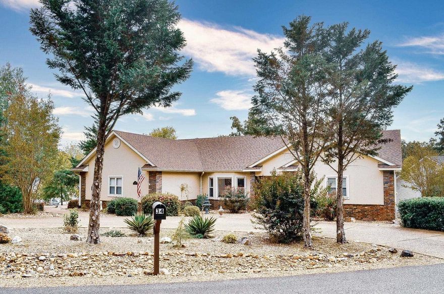 Beautifully updated home on a prime corner lot. Welcome home to this well maintained property with a long list of recent updates. The current owner has completed refreshed the kitchen with all new appliances including a convection microwave, a great compliment to the oven, granite countertops and modern hardware. Enjoy new luxury vinyl plan flooring in the dining room, hallway and family room. New granite countertops also in both bathrooms also are an added bonus. Custom remote retractable blinds in the  living room offer modern convenience. Relax or entertain on the brand new deck or cozy up by the gas fireplace. 2 Hot water tanks, fresh exterior paint. Roof replaced in 2023 helps provide peace of mind. This move in ready home all on one floor combines thoughtful updates with every day functionality-a must see in a very desirable location.
