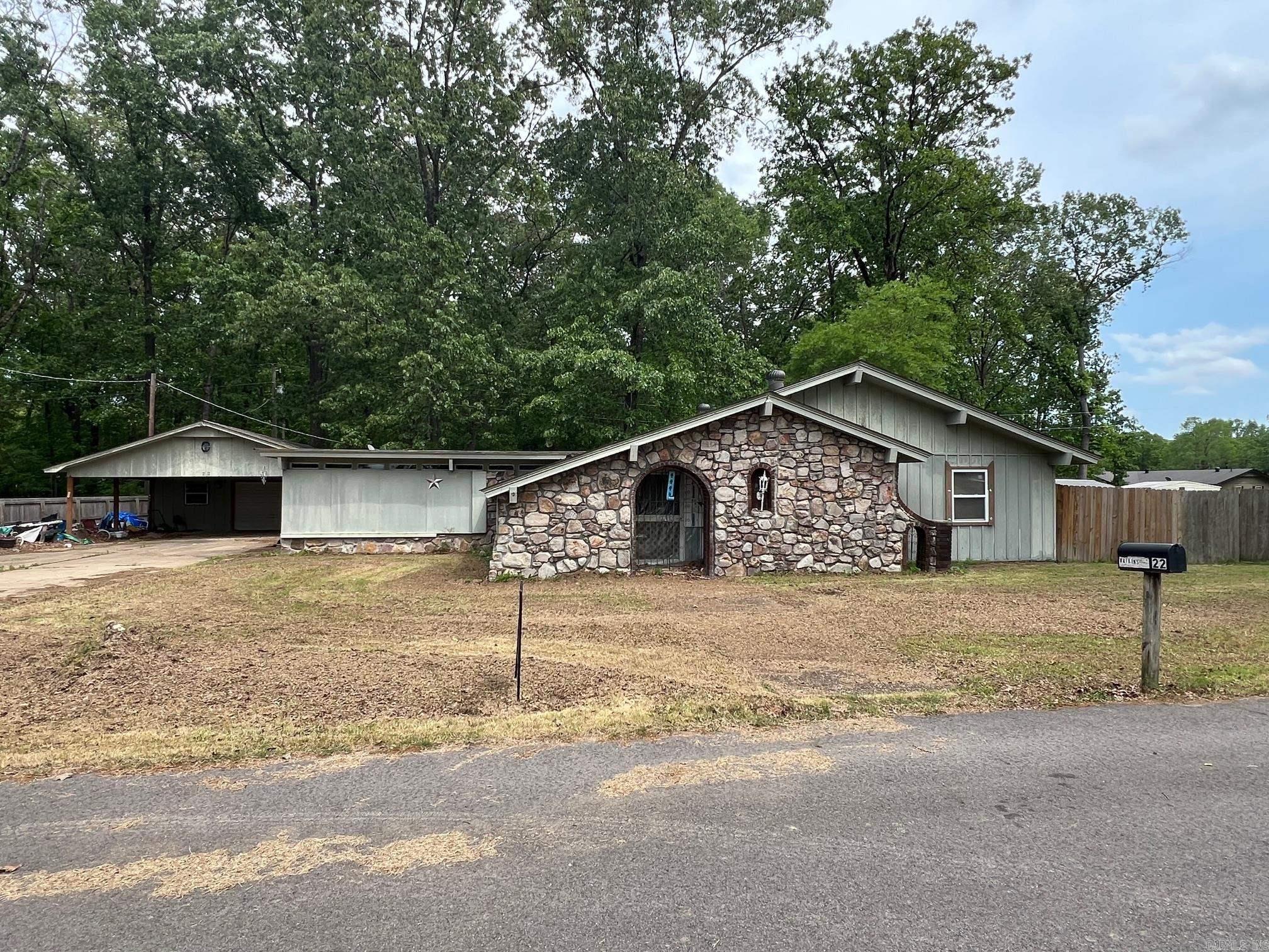 Three Bedroom Two Bath House located in Conway County about 6 miles from Petit Jean State Park. Property has a fenced yard and a shop