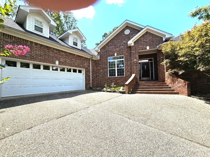 Nice all-brick home with vinyl accents located on Magellan Golf Course, offering approximately 2,500 sq. ft. of one-level living plus an Arkansas room (not included in the square footage) This 3-bedroom, 2-bath home features high-volume ceilings, crown molding throughout, split-bedroom design, and a dedicated office space. The spacious kitchen boasts abundant cabinetry, granite countertops, and floors are a blend of tile, wood, and carpet. The oversized primary suite includes a walk-in shower and a therapy walk-in tub for added comfort. Additional highlights include a formal dining room, breakfast area, large laundry room, and an oversized garage with stairs to a finished bonus room with h/a-Priced at $419,500, this home combines comfort functionality on a prime golf course setting.
