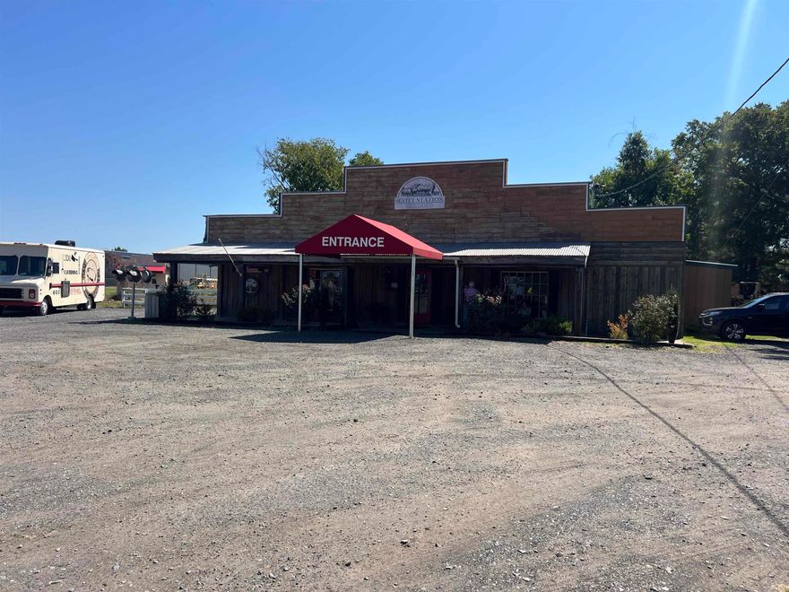 Step into a well-known local favorite with this 3,170-square-foot restaurant, The Train Station, celebrated for its mouth-watering BBQ and a menu packed with other crowd-pleasing dishes. This turnkey property includes a full liquor license that can be transferred to new ownership, making it an exceptional opportunity for an experienced restaurateur or an ambitious entrepreneur ready to take over a thriving business.The Train Station isn’t just about great food, it’s a destination. Guests enjoy live music events held once a month, drawing in loyal locals and travelers alike. Adding to its charm, the restaurant sits right next door to The Curve, a popular market offering home-grown vegetables, fresh fruit, local honey, and unique gift novelties, creating natural synergy and steady foot traffic. If you’ve been looking for a well-established business in a prime location with room to grow, The Train Station is ready for its next chapter, yours.