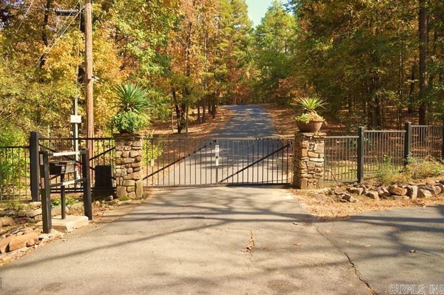 Beautiful lot in the desirable Woodsong, gated neighborhood.  Five acres.