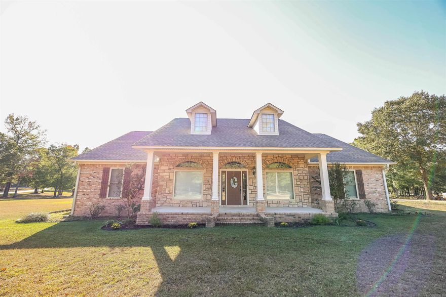 Welcome to 127 Whispering Oak Circle!  This charming three-bedroom, two-and-a-half-bath home is nestled on 6 acres in the highly sought-after Dry Creek Estates neighborhood. Offering the perfect blend of modern updates and rustic charm, the property boasts:  *Spacious interiors  *A large shop, ideal for projects or storage  *Ample outdoor space for privacy and recreation  All while still being conveniently close to town and its amenities. This home offers both tranquility and accessibility!