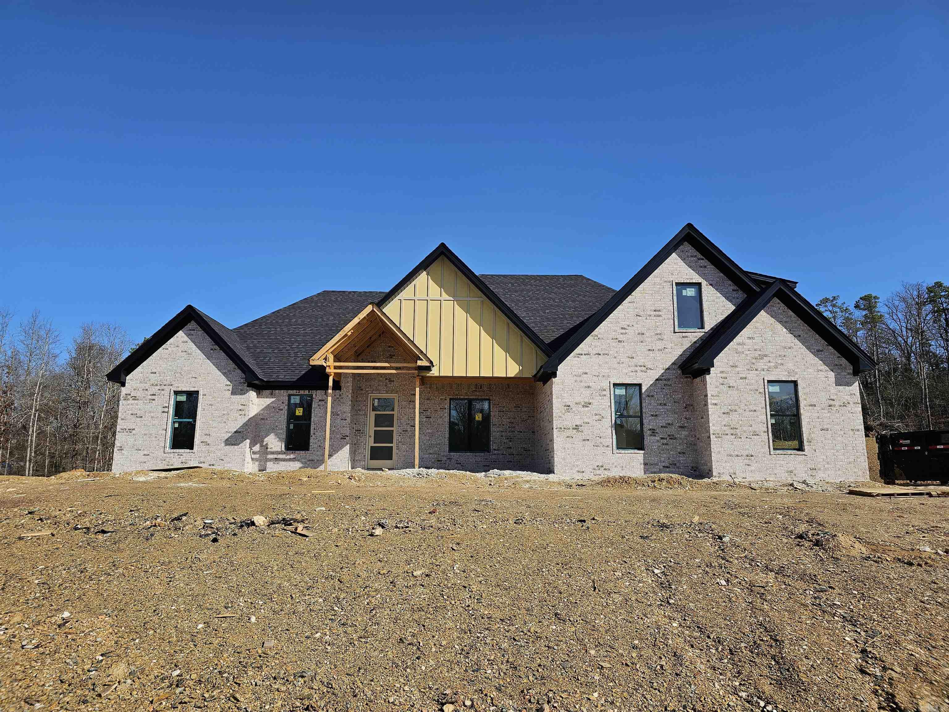Sitting on 2.11 acres, this 2850 sqft, 4-bed, 3.5 bath home offers a well-planned layout with 3 beds & 2.5 baths downstairs, 1 bed & 1 bath upstairs, plus a spacious office for work or study. The gourmet kitchen features ample cabinet space and a walk-in pantry, perfect for storage and organization. The primary suite boasts a large walk-in closet and a spa-like bath for ultimate comfort. A 2-car garage provides convenience, while the gated community ensures privacy. 2 months until complete.