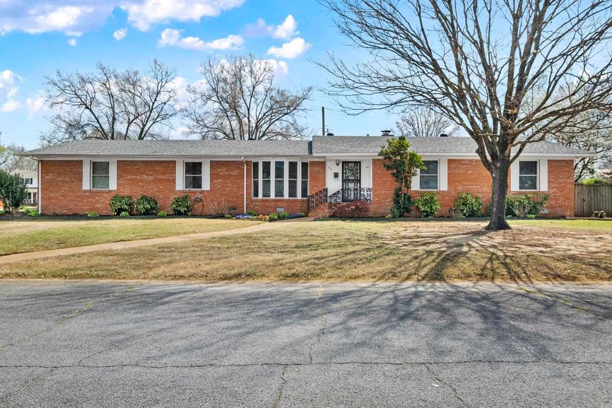 This versatile home features 3 living areas including a formal living room with large windows, a den/family room with built-ins and a lovely brick fireplace and a playroom/sunroom addition off the back of the home & stunning natural light with large windows! The kitchen has been remodeled including all new appliances, countertops, fixtures and backsplash. The spacious laundry room has plenty of room for pantry storage and even has an office addition off of it. All rooms have hardwood or laminate floors and tile/luxury vinyl in the bathrooms and kitchen. There are two eating areas including a separate formal dining room featuring two corner china/dish hutches and a spacious breakfast area. This well-maintainedl home is full of original charm and character with many updates along the way including windows and an updated primary bathroom. This beautiful home sits on a spacious corner lot with a fenced backyard on a quiet cul de sac. Call to make your appointment today!