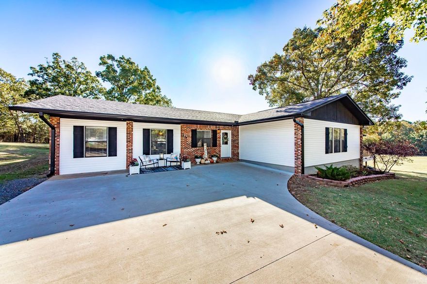 Welcome home to peace and plenty of space! This inviting 4-bedroom, 2-bath home sits on 3.65 beautiful acres at the end of a quiet dead-end road. Remodeled in 2016, it offers an open floor plan with a large family room perfect for gathering & making memories. The spacious primary suite includes a cozy gas fireplace, walk-in shower, & his-and-her walk-in closets—an ideal retreat at the end of the day. Step outside to a huge yard made for kids, pets, gardening & outdoor fun, or relax on the large deck that’s perfect for grilling, entertaining, or simply enjoying the peaceful surroundings. There is a 12x16 shop/storage building with electricity perfect for hobbies. Located just 6 miles from Choctaw Campground/Marina on stunning Greers Ferry Lake & half a mile to Walmart and Ozark Health hospital, this home brings together quiet country living, close proximity to city amenities & easy access to the water.