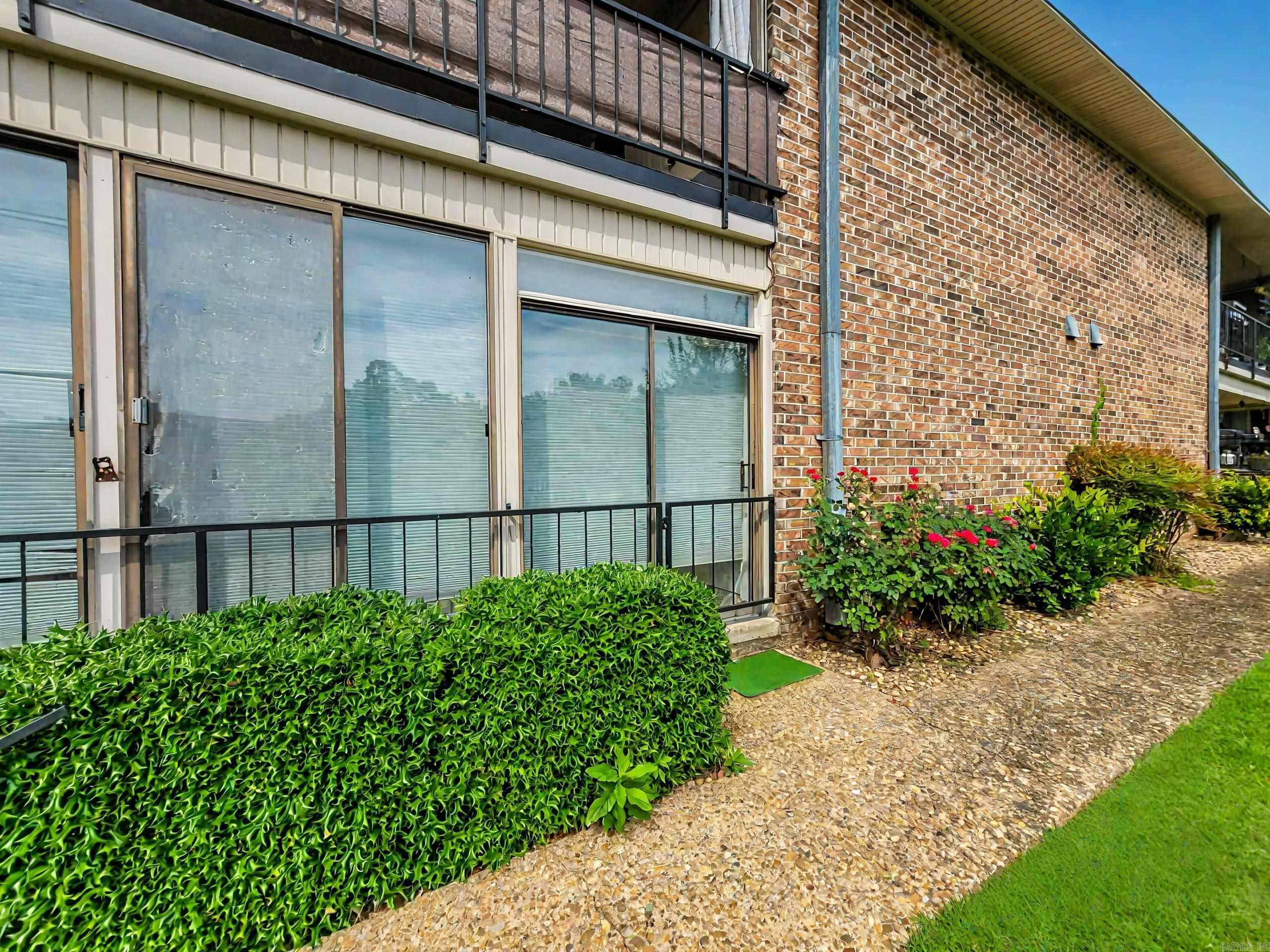 Welcome to this fully furnished lakefront condominium with your own boat slip and two private boat ramps. The large swimming pool, pool house, and gazebo are for members and guests only. Two assigned parking spots with plenty of guest parking. Go from your vehicle to inside the condo without encountering any stairs. Ready to be an income generating short-term rental, a vacation home, or a full-time residence.