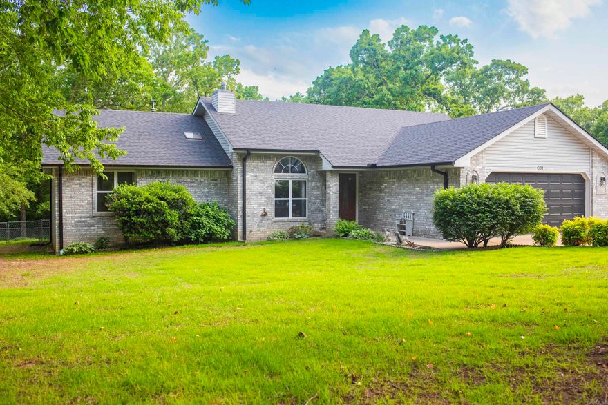 Charming brick home in a desirable neighborhood, featuring dual master suites with spacious walk-in closets. Enjoy a private, fenced backyard with a storage shed, backing to a peaceful wooded lot. A large covered deck is perfect for bird watching or hosting barbecues, surrounded by beautiful flower gardens. Inside, a brand-new gas fireplace insert adds warmth and charm to the living area. Sleek laminate flooring flows throughout the home, which has been meticulously maintained and is truly move-in ready. Major updates include a roof replaced just three years ago, a newer AC unit, and a brand-new water heater for added peace of mind. Listed at $319,900.