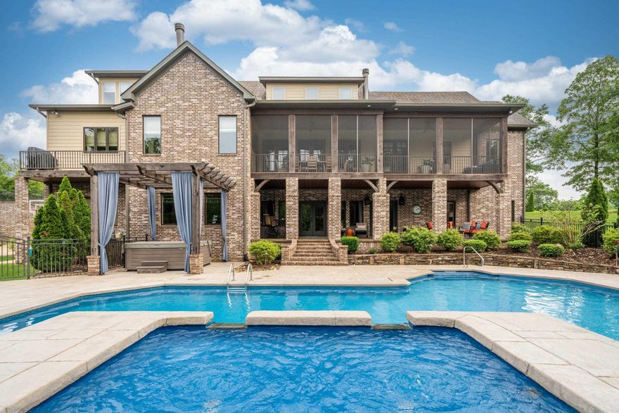 BEAUTIFULLY APPOINTED custom-built family home in Red Oak Ridge Subdivision! Every room of this professionally designed and decorated home is warm and inviting. Home features 6 bedrooms, 5 baths with 2 half baths with approx 8,600 sq ft. of family-friendly spaces. This home truly has it all including in-ground pool with waterfall, hot tub with gazebo, basketball area, 2 private patios overlooking the pool including a screened in porch, as well as a covered front porch, and so much more. The main kitchen features a stainless steal Thermador refrigerator and 6 burner Thermadore stove with griddle and 2 ovens, ice maker, 2 dishwashers, Miele built-in coffee maker, granite, large island with built-in storage and butlers pantry. The main walk-in level has an office, dining room, living room, the spacious primary suite with spa-like bathroom, the main kitchen with hearth room and dining area, large laundry room & 2 half baths. The upper level has 3 large bedrooms each with ensuite bathrooms, a large playroom with 3 built-in bunk beds & a sitting/living room. The lower area of the home features a mother-in-law quarters/game room/hobby area with kitchen, living room, 2 beds & 1 full bath.