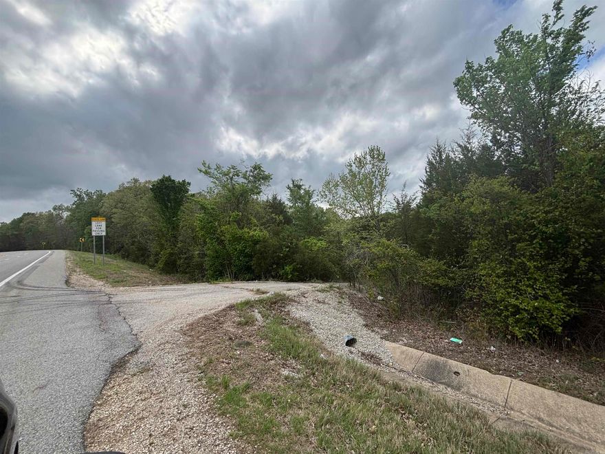 5 lots on Little Creek Circle. Back side of property reaches Hwy 167. Mostly wooded with a small creek. Property can be used for commercial or residential use. Utilities available at the road.