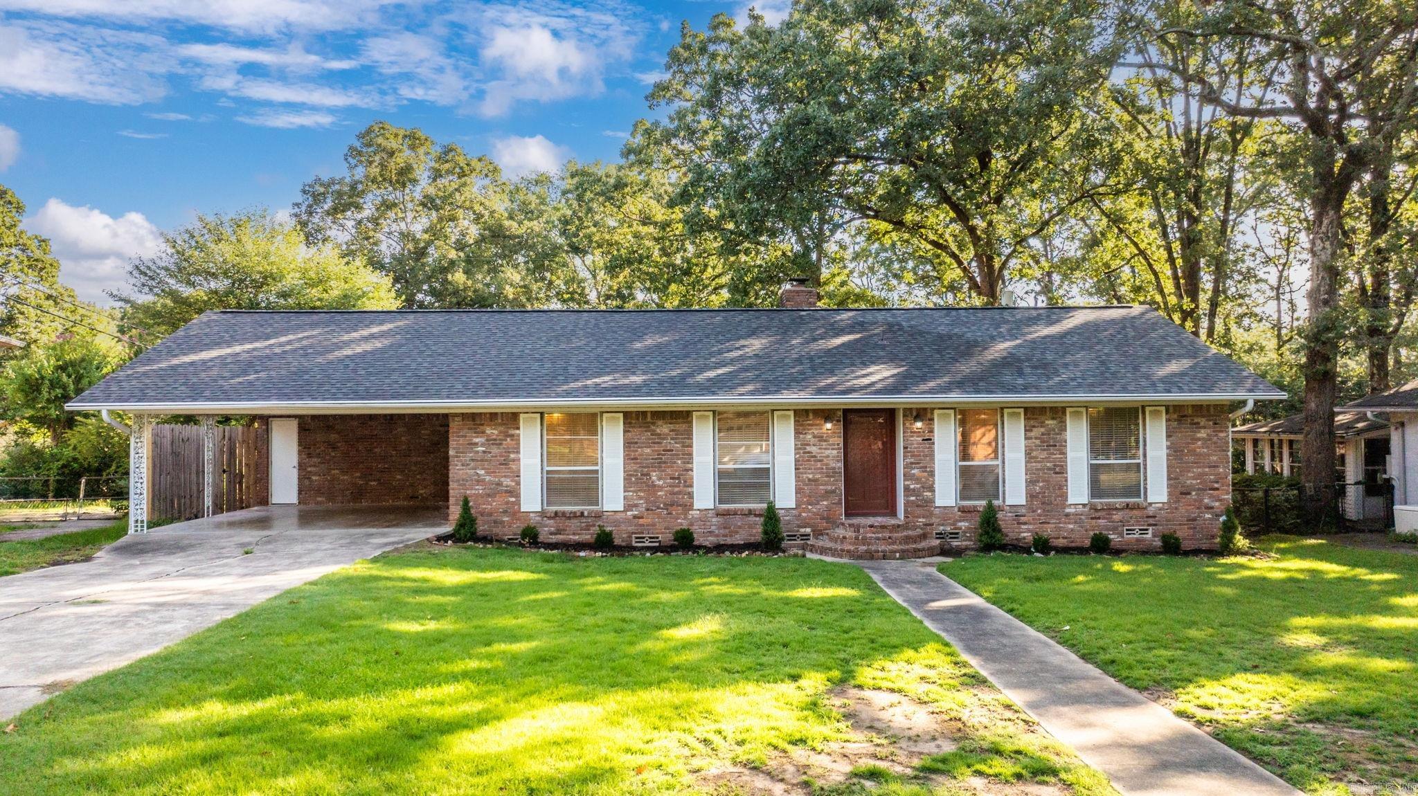 Stunning 3-BR, 3-Bath Home in Desirable Lakewood! This beautifully updated all-brick home offers the perfect blend of modern updates & timeless charm. Featuring 2 primary suites, one is separate from other BRs. This home is ideal for comfortable living and entertaining. Fully remodeled kitchen is a showstopper, complete with all new stainless steel appliances, a coffee bar, gorgeous granite countertops and backsplash, new cabinetry with ample storage, a pantry and modern lighting. The open-concept layout flows seamlessly into one of the inviting living areas, highlighted by a cozy gas log fireplaceāperfect for gatherings. The second living/dining area is filled with natural light from oversized windows, offering plenty of space for entertaining or family gatherings. You'll love the mix of refinished original hardwood floors and new luxury vinyl plank (LVP) in one of the bedrooms. Recent upgrades include a new roof (2024) and a 5-ton AC unit (2023) for year-round comfort. Walking distance to Crestwood Elementary School. Too many updates to list, come take a look. Location is convenient to shopping, restaurants and interstate.