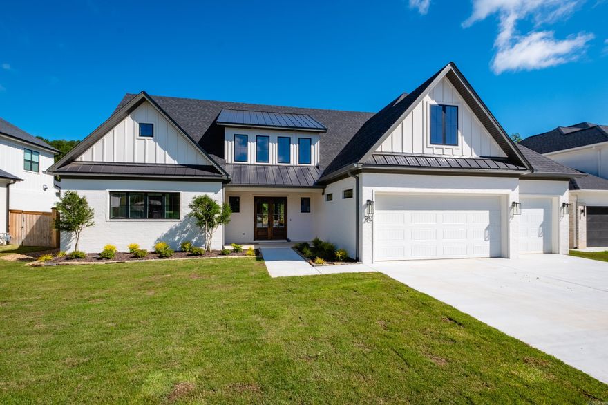 Welcome to this stunning new construction home tucked away in a quiet cul-de-sac, perfectly positioned with green space behind—offering privacy and a view you’ll love year-round. This thoughtfully designed home features a spacious main-level layout, including an incredible primary suite complete with 2 walk-in closets—perfect for keeping organized without compromise. The heart of the home is an open-concept kitchen, dining, and living area that blends beauty and function. With abundant storage, a walk-in Butler’s pantry, secondary spot for a refrigerator, and ice machine, the kitchen is ideal for both everyday living and entertaining. Also on the main level is a guest suite and laundry room. Upstairs, you’ll find a large, versatile flex space that can adapt to your lifestyle—great as a media room, play area, or home office. Three well-appointed bedrooms surround this space; one enjoys a private en suite bath, while the other two share a practical Jack and Jill bathroom. Don’t miss the walk-out attic space, perfect for storage or future expansion, and a dedicated craft closet!  Step outside to enjoy a generous, level backyard featuring an expansive patio with a cozy fireplace!