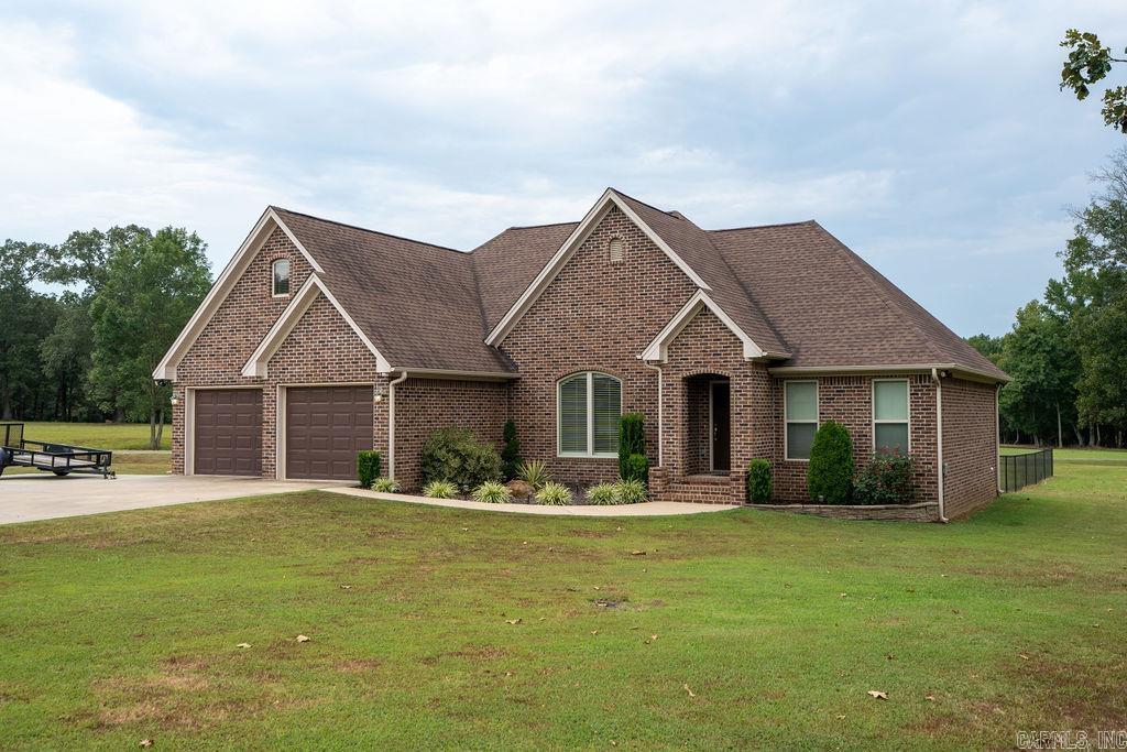 Beautiful custom-built brick home on 2.25 acres just 13 miles north of Searcy. This 4-bedroom, 2.5-bath home is very well maintained and features many recent updates. Enjoy a spacious 2-car garage with a safe room and storage closet, a fenced backyard, gutters, exterior soffit lighting, beautifully landscaped yard, and two storage sheds for all your needs. This property offers the perfect blend of comfort, style, and functionality in a peaceful country setting.