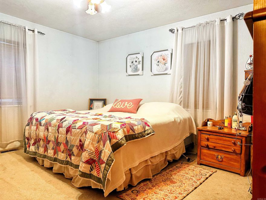 Welcome home to the lovely little end of the road community of Bethesda! This spacious two bedroom, one bathroom home is cozy, inviting, and move-in, ready! The 3 acre parcel offers some room to play and this property has some additional perks including a 20x24 shop with lean to off of the back, a 14x20 finished storage building, an attached carport, and a 12x20 detached carport! Like to garden? The spot is already established! New roof in 2022 is an added bonus!