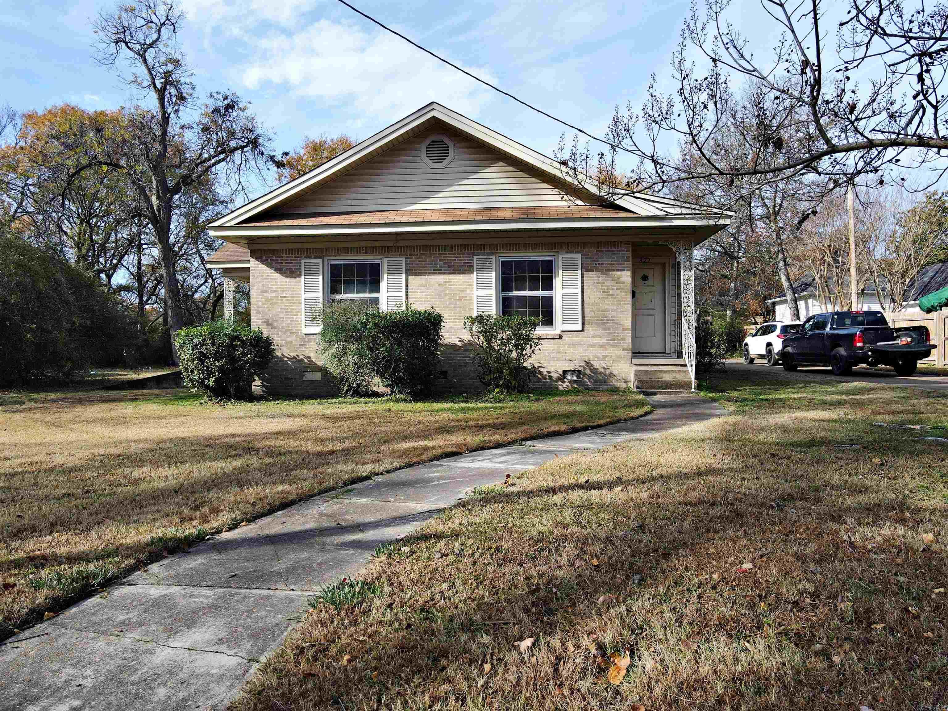 Location, location...This house is loaded with character and space for a growing family.  Large lot with plenty of parking, located only a few steps from Henderson State University.