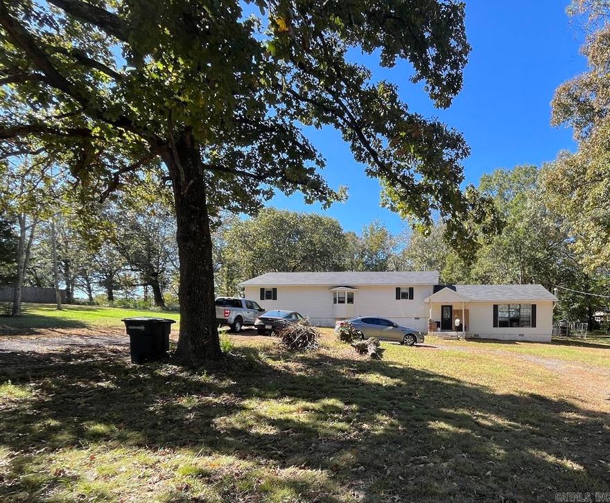 Enjoy the best of both worlds with this 3 bedroom, 2 bath home situated on almost ¾ of an acre—offering a spacious lot and peaceful country feel while still being just minutes from town and conveniently close to LRAFB. With plenty of outdoor space to spread out, garden, or entertain, this property gives you room to breathe without sacrificing location. Inside, you’ll find hard surface flooring throughout for easy maintenance and a functional layout ready for your personal touch. The primary en suite features a large walk-in shower, dual vanities, and a walk-in closet, creating a comfortable retreat at the end of the day. Whether you’re looking to settle in and customize it to your style or invest in a property with great potential, this home is full of opportunity in a prime location. No seller property disclosure available, buyers should calculate their own lot size.