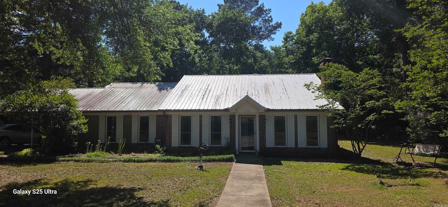 Beautiful home sitting on just under a acre. Property is well established, mature trees, lots of shade, with plenty of room for a growing family and easy upkeep. Oversized master that connects to the large laundry/ office area. Two storm shelters, above and below ground. New septic in Jan. 2024, Zoned Heat/AC. Metal roof around 6 years old.  Small shop w/electric and two additional storage buildings, one with electric. Just outside city limits but not far from either Vilonia or Conway.