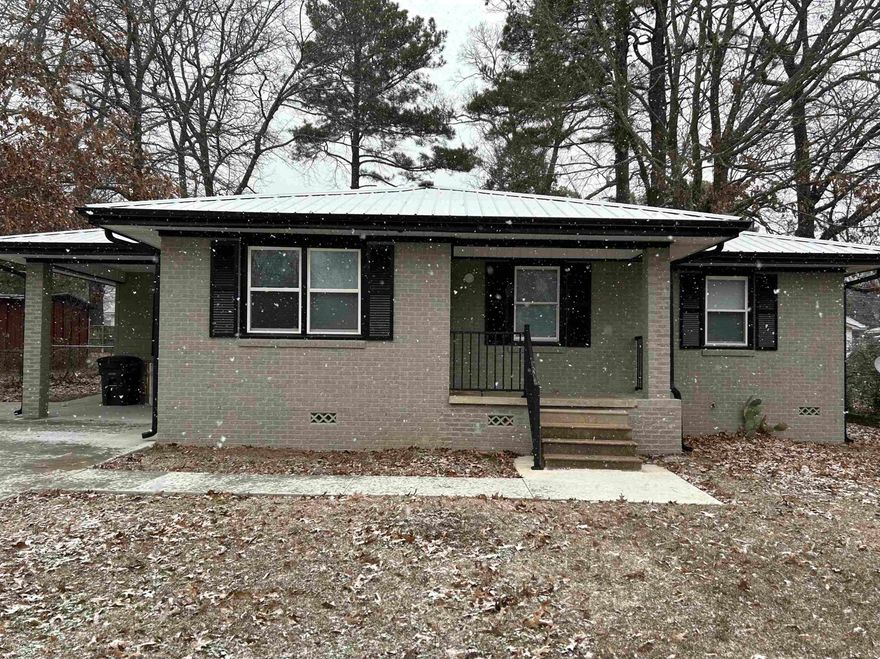 GREAT home on an awesome, tucked-away but OH so convenient street! The age of this home is deceiving, because the seller has put in new plumbing, new electric, new cabinets and countertops, new appliances, new sheetrock, new flooring, new trim, and a new HVAC! Home was remodeled in 2023. The driveway and sidewalks are also completely new summer 2024! This house is as nice as can be, with a great fenced yard, a huge covered back patio, and a large storage building in the back. Come take a look today and make this home yours! SEE AGENT REMARKS!