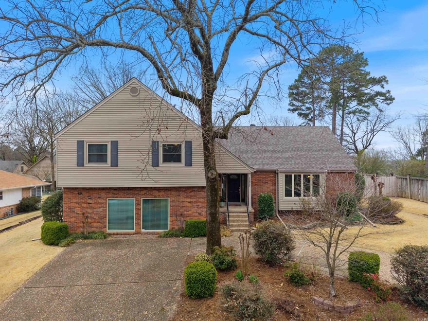 Have you dreamed of a home big enough to entertain your family and friends? This one is a must-see! Welcome to this stunning property that awaits you in the heart of Little Rock! Featuring 4 bedrooms and 2.5 baths, this home offers ample space for everyone. Imagine hosting gatherings in the formal living and dining rooms,or cooking up a storm in the Chef’s Kitchen with an eating area that overlooks a heated and cooled sunroom—perfect for year-round enjoyment. The lower level is an entertainer's paradise, boasting a cozy family room and a den with a fireplace and bar area,complete with a built-in ice maker. That's 4 living areas with tons of storage! Upstairs,you'll find a meticulously updated prim suite to die for,along with 3 additional bedrooms and another renovated full bath.Bring your S’mores and step outside to a spacious backyard with a covered patio and a fire pit area, ideal for unforgettable outdoor gatherings. This home is conveniently located near the neighborhood park and pool, and within walking distance to churches and schools. Finished room that had been garage could be converted back to garage if desired.