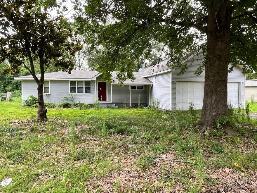 This delightful home provides a warm, cabin-like living area with wood ceilings. The balcony/loft offers a cozy retreat with a rustic touch or could be used as a Bonus Room for living. Adding to its appeal is a spacious shop on the property, ideal for projects and extra storage. This home combines comfort and practicality in a peaceful environment.
