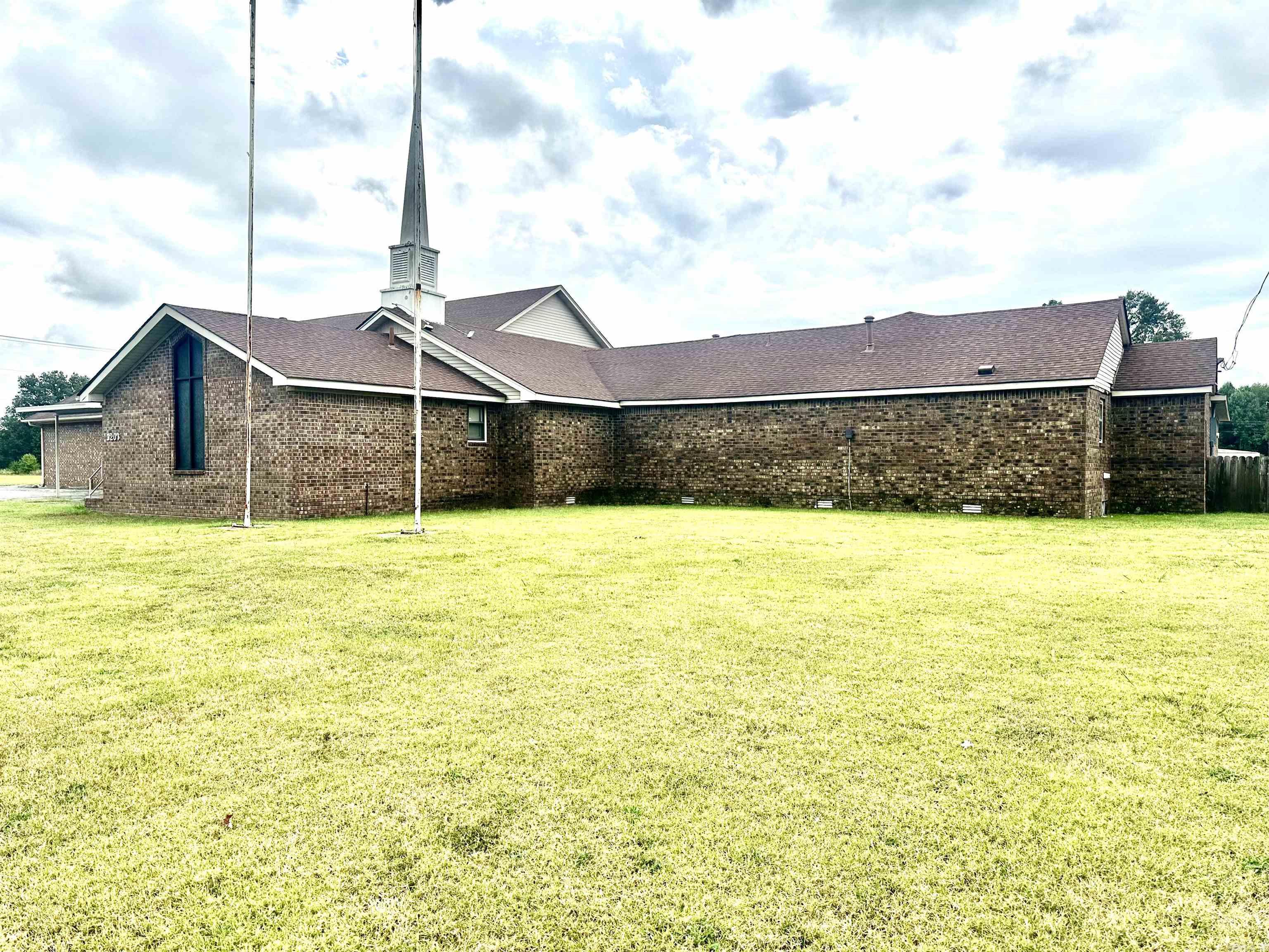 Exceptional church property with beautiful sanctuary, ten large classroom/meeting rooms, and spacious fellowship halls. Also features a large welcoming foyer. Ideal for worship services, schools or community use. Call agent to schedule a tour-It's ready for church service!