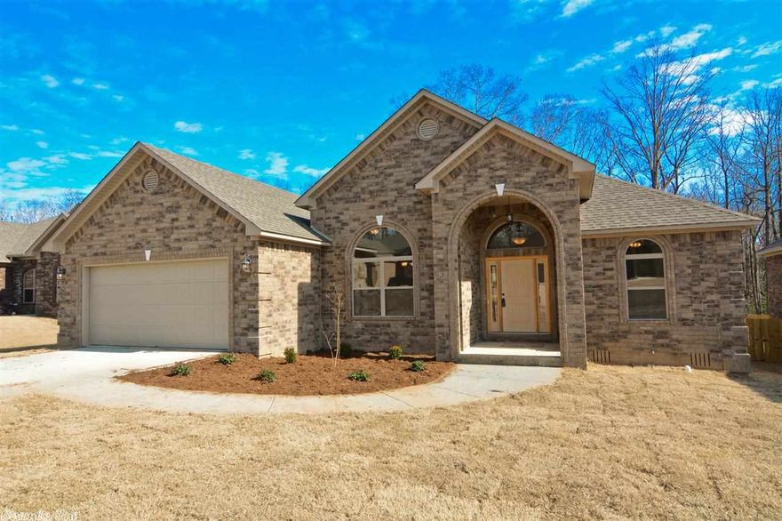 New brick home close to back gate of base.  Lovely stained wood cabinets  with granite counter tops. Double pan ceilings, gas fireplace, oversized garage. Custom built with 10 year bonded builder warranty.