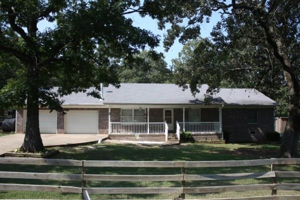Bring your horses and come check out this fabulous 3 bedroom 2 bath brick home on over 5 acres fenced. 2 car over sized garage and extra outside storage. Home has stainless steel appliance in the large eat in kitchen. Great room features wood burning stove with tile surround. Bedrooms are over sized and the hall is handicap accessible. Covered deck and fenced yard for kids to play. 100% financing available. Please see agent remarks