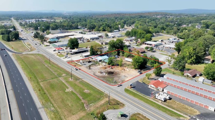 Prime 4.3 acre corner lot with highway frontage in the rapidly growing Mayflower market. This exceptional property sits directly in front of the 1-430 merge lane, offering outstanding access, traffic flow, and visibility. Located between Maumelle and Conway, the site benefits from consistent commuter traffic and regional connectivity. The corner positioning and interstate exposure make it ideal for a wide range of commercial uses including retail, service, hospitality or mixed use development.