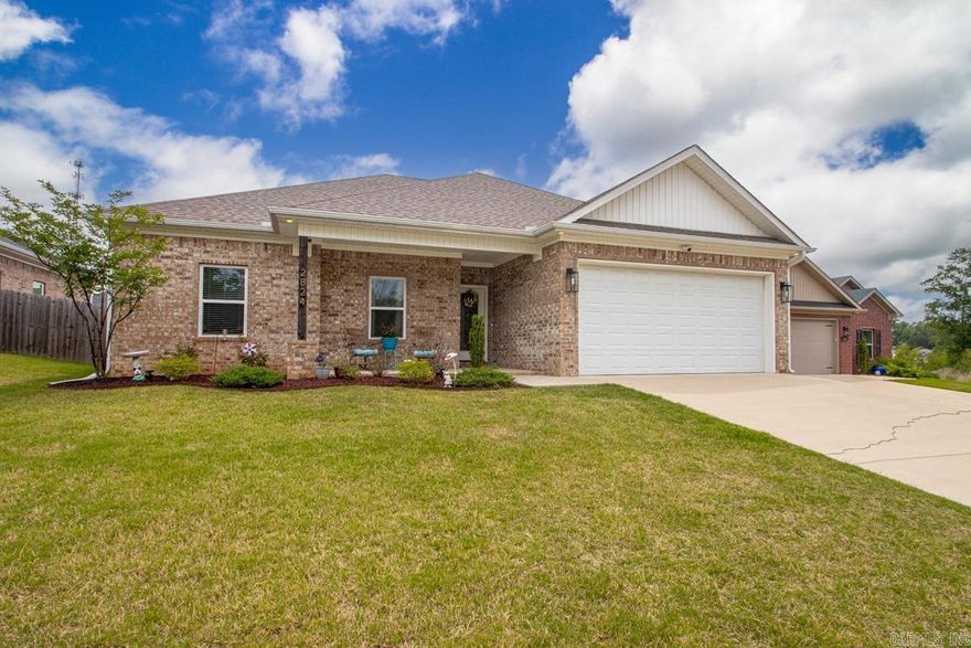 Welcome to this beautifully maintained 4 bedroom 2 bathroom home offering 1965 sqft in the Northshore Ridge neighborhood in Benton. Designed with an open split floor plan, this home provides both functionality and comfort for everyday living.  The spacious living area features a cozy gas fireplace and the kitchen flows seamlessly into the main living space creating an inviting atmosphere for gatherings. In the primary suite you'll find a spacious primary bathroom with his and her vanities, walk-thru tile shower, soaking tub, and large walk-in closet with plenty of storage. Enjoy the added bonus of a fully enclsosed back porch, giving you extra space that can be used as sunroom, office or second living area. When you step outside you'll find a fully fenced backyard complete with a 12x12 shed with electricity, perfect for hobbies, storage , or a workspace. This one truly has it all! Schedule your showing today!!!
