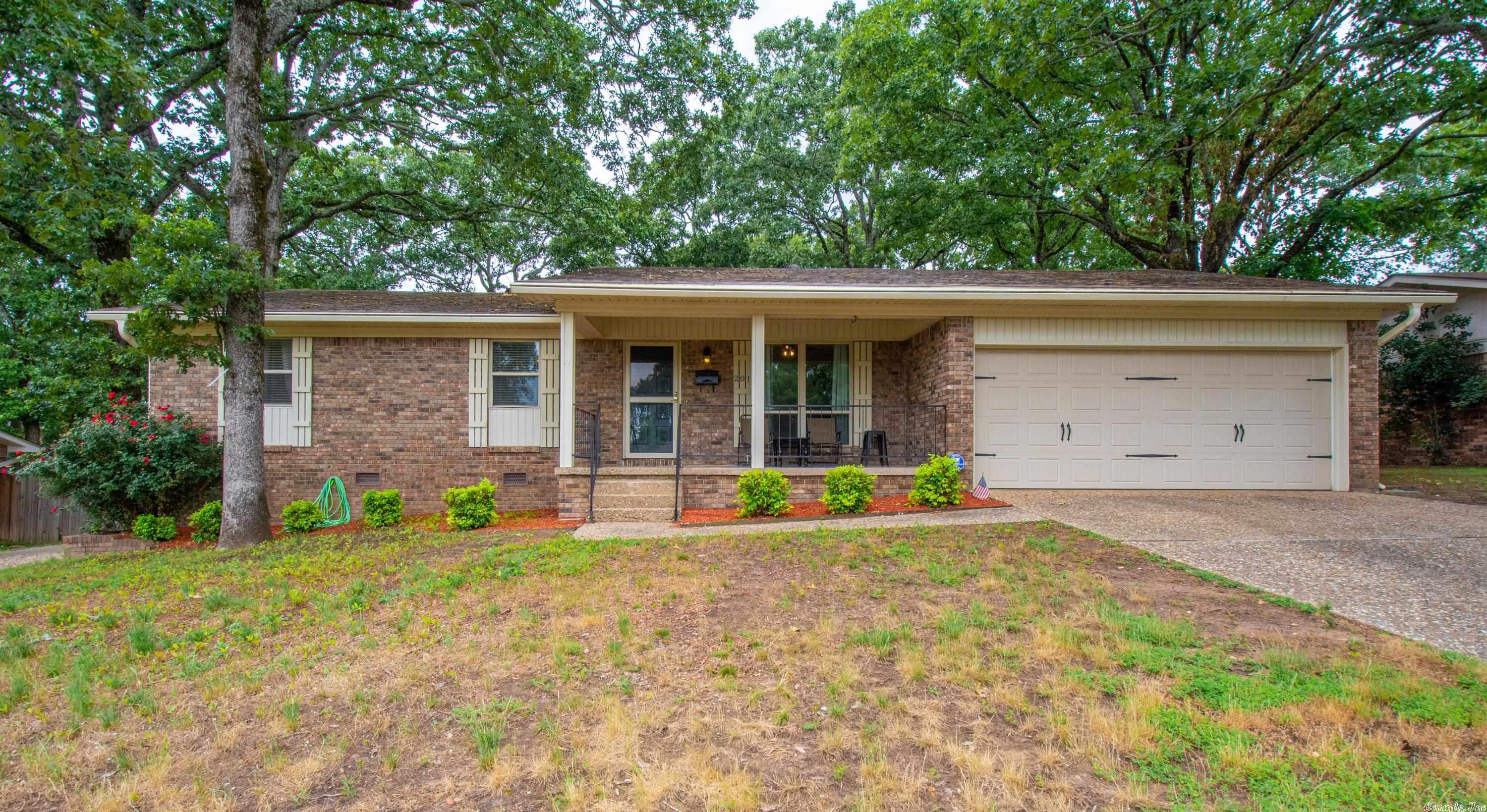 This all brick 3 bedroom 2 bath home features 2 living areas with a gas fireplace and lots of room for entertaining. Large laundry room with washer, dryer and upright freezer that convey. The kitchen has plenty of counter space and a new dishwasher. Refrigerator will convey. Seller installed a new AC unit this year. Walk in shower is handicap accessible. Backyard is fully fenced with a storage building and there is a side driveway with double gate to enter the backyard. Home needs carpet/paint. See agent remarks