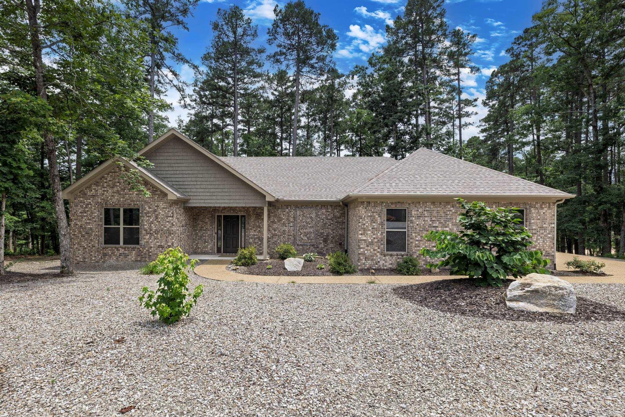 Want new but don't want to build? Now is your opportunity to walk in to this stunning home built by Renaissance Homes that has been meticulously cared for in the desirable Siega neighborhood! This all brick home welcomes you from the moment you drive up! Walk in the door and you will see how you can entertain with ease in this open plan. Large island in the kitchen is open to the great room. Plenty of pantry space with the walk in pantry. Great room features a corner linear electric fireplace and crown moulding throughout. Breakfast area is open to kitchen and great room. Primary bedroom with engineered hardwood and primary bath with oversized snail shower, double sinks, large linen storage & walk in closet. Divided bedroom plan giving you & your guests the privacy desired. Guest bathroom with tiled tub shower area and additional linen storage. Separate laundry room completes the plan. Side load two car garage. Step out back to enjoy the large covered patio and lower grilling patio. This beautiful home is just steps to the Siega Trail and that connects to the Hernando Trail. AGENT RMKS