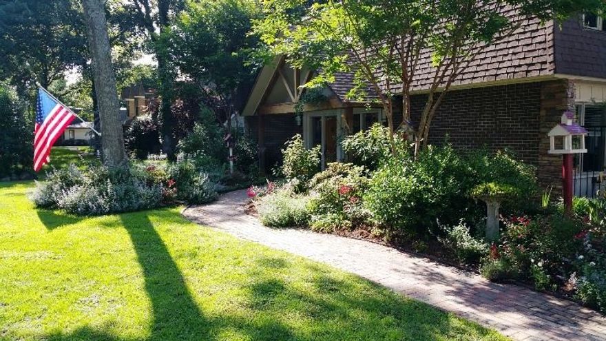 Cape Cod style home featured in the Better Homes and Gardens magazine... is what it will feel like when you enter this beautifully custom updated home. There are 3 large bedrooms, 2 full baths, and a half bath off the kitchen area. This unique home offers decorative built-ins in both living areas, along with an abundance of windows for natural light. The master bedroom is oversized with an extra sitting area.