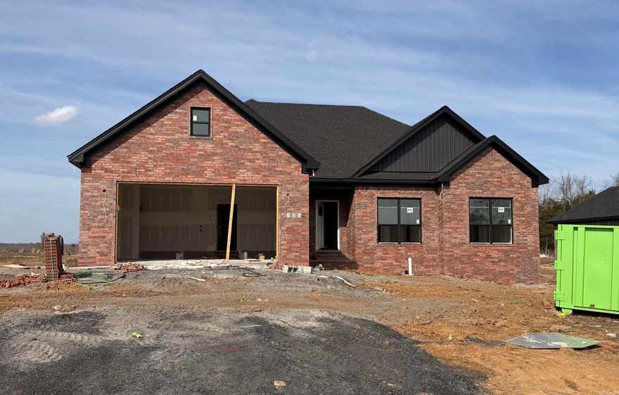 Welcome HOME! Looking for a split but open floor plan made for entertaining? Look no further! Walk in to the Next Gen water proof hardwood floors in the open living room and kitchen area with beautiful custom cabinets to the ceiling, large island, quartz countertops, and stainless steel appliances! Coffered ceiling in the living room for that pop of extra custom detail along with an electric fireplace for the homey feel. Huge laundry with extra cabinetry. Primary suite features separate vanities, custom tiled shower, soaker tub, and a huge walk in closet! Opposite side of home features 3 bedrooms, linen closet and a bathroom. Did we mention the MASSIVE covered back porch. The perfect place to watch games, have parties and celebrate life with friends and family! Estimated completion April 2026. Call your agent today to schedule a showing before this one is gone!