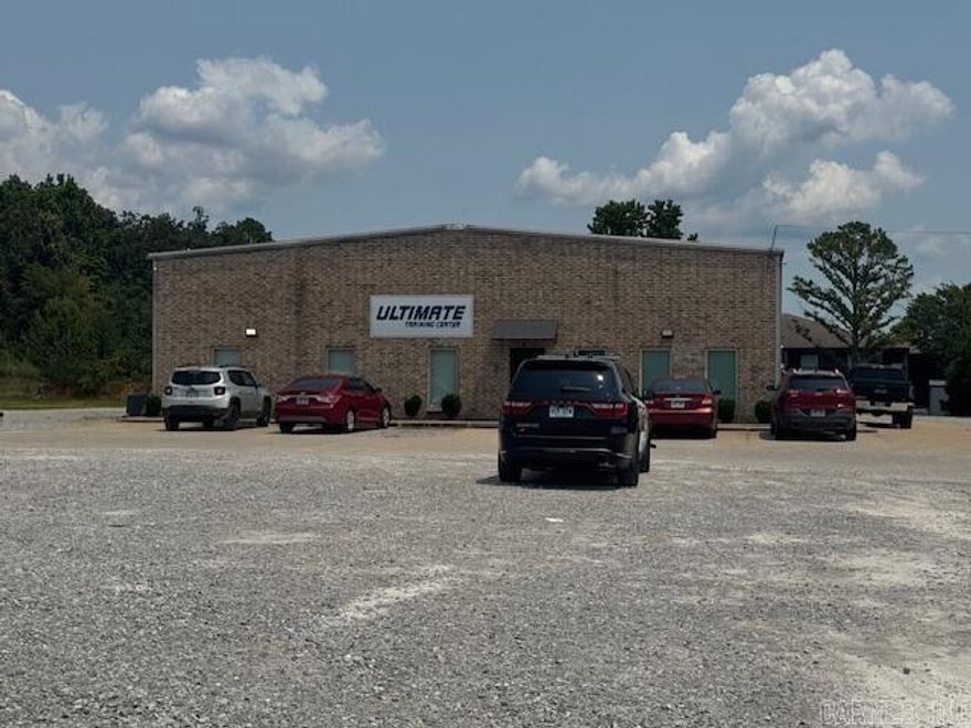 Large newer warehouse type commercial building behind Hawgg's between Hwy 167 & White Drive. Downstairs has approximately 7200 sq ft of warehouse space with overhead doors as well as 2 full bathrooms, 4 office areas, break-room, lobby/reception area and utility. Plus additional upstairs of approx 1800 sf with office/storage space. Camera/surveillance system with night vision, 2 large commercial electric CHA systems for warehouse as well as another for office space.