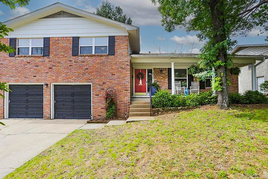 Welcome to this beautifully maintained home nestled in one of the city’s most sought-after, well-established neighborhoods. Enjoy the charm of mature trees, walkable streets, and unbeatable convenience.  Step inside to timeless elegance with original hardwood flooring that flows through the main living areas — adding warmth, character, and lasting value.  The open-concept living space, dining room, and living space create the perfect atmosphere for entertaining.  The kitchen and bathrooms are updated with granite countertops throughout, combining classic beauty with modern function.  Downstairs, enjoy a versatile playroom and bar area complete with its own half bath and woodburning fireplace creating a cozy focal point.  The large master suite offers a peaceful retreat, and each additional bedroom is generously sized with plenty of natural light and large walk-in closets.  This home blends classic charm with thoughtful updates — truly move-in ready. Homes in this location don’t last long!  New Roof and chimney cap: 2023 New HVAC and Duct Work: 2021 New 40 Gallon Hot Water Heater: 2024 New Dishwasher: 2021 Newer windows New Sump Pump: 2024 Newly Stained Deck  Agents see remarks
