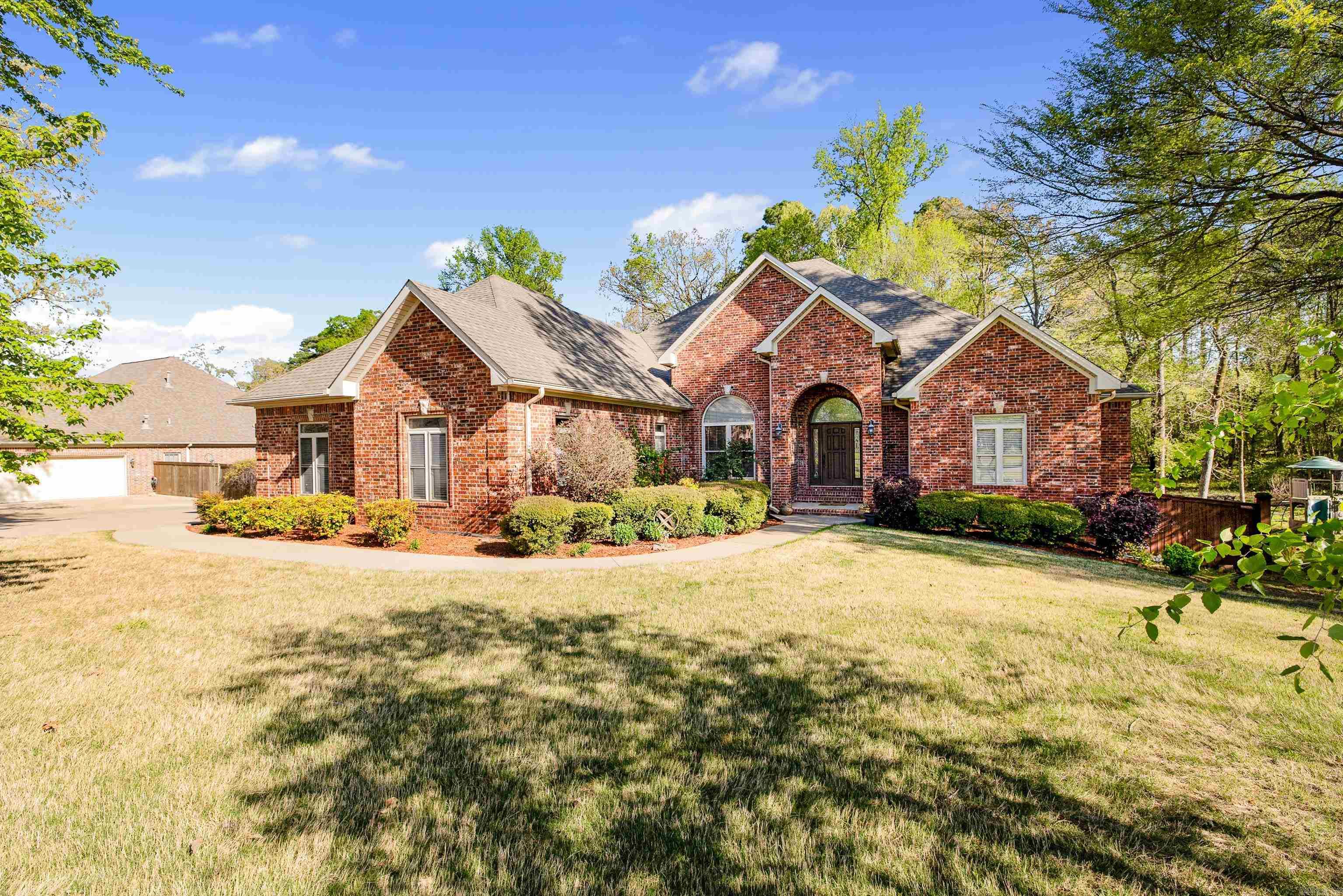 Welcome to your dream home in the highly sought-after Hurricane Lake subdivision! This beautifully maintained 4-bed, 3-bath home offers over 3,100 sq ft of spacious living, a true gem in this community. Enjoy an open, flowing layout with generous living space, formal dining room, extra large laundry room, 3-car garage, and thoughtful finishes throughout. Ready for entertaining with a new wine fridge in the dry bar. Then just step out back to your private retreat featuring a large deck with hot tub, perfect for relaxing under the stars. Beautiful fresh landscaping just done to top it all off, and has a sprinkler system. Home has 2 water heaters and recirculating hot water system. Walk in crawl space has tons of space for extra storage. Adjacent lot (#87) also available MLS # 25019208 Neighborhood amenities include lake access, community pool, clubhouse, & pickle ball courts — all just moments from your front door. Don’t miss out on this great home in Hurricane Lake, combining comfort, space, and lifestyle in one perfect package!