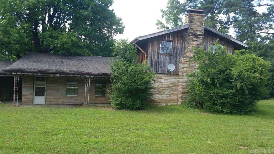 Much potential here!  Very spacious w/ two seperate living areas and a fireplace!  Large, level lot w/ small lake behind property. This is a Fannie Mae property.  See remarks please.