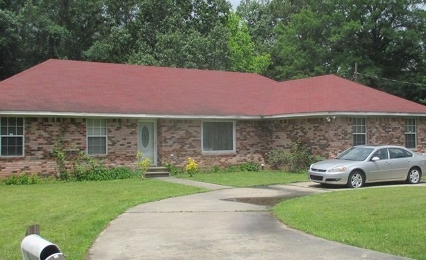 Large brick home on corner lot.  Home has tile throughout, split floor plan, large master bedroom.  Home has 4 bedrooms and 3 baths. **Agents see Remarks**