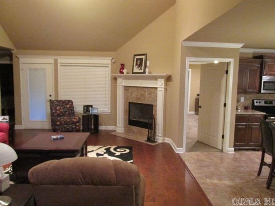 Home features open floor plan with spacious master bed room and bath.  Walk in closets though out.  Vaulted ceilings and lots of crown.  This Home is if it were brand new, well taken care of move in ready, needs nothing!  This is a must see.  NOTICE: Alarm system included except, Garage door remote on wall , window contacts and hallway smoke detector do not convey.  Garage remote wall unit and a hall way smoke detector will be replaced and installed.  Sq. Ft. approx. measuring is encouraged.  SEE REMARKS