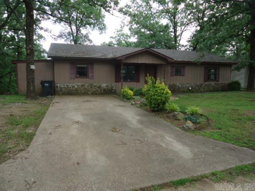 Come see this 3 bedroom 1 bath home in the heart of Hot Springs.  This home features an open floor plan, large back yard, outside storage, and a covered deck.