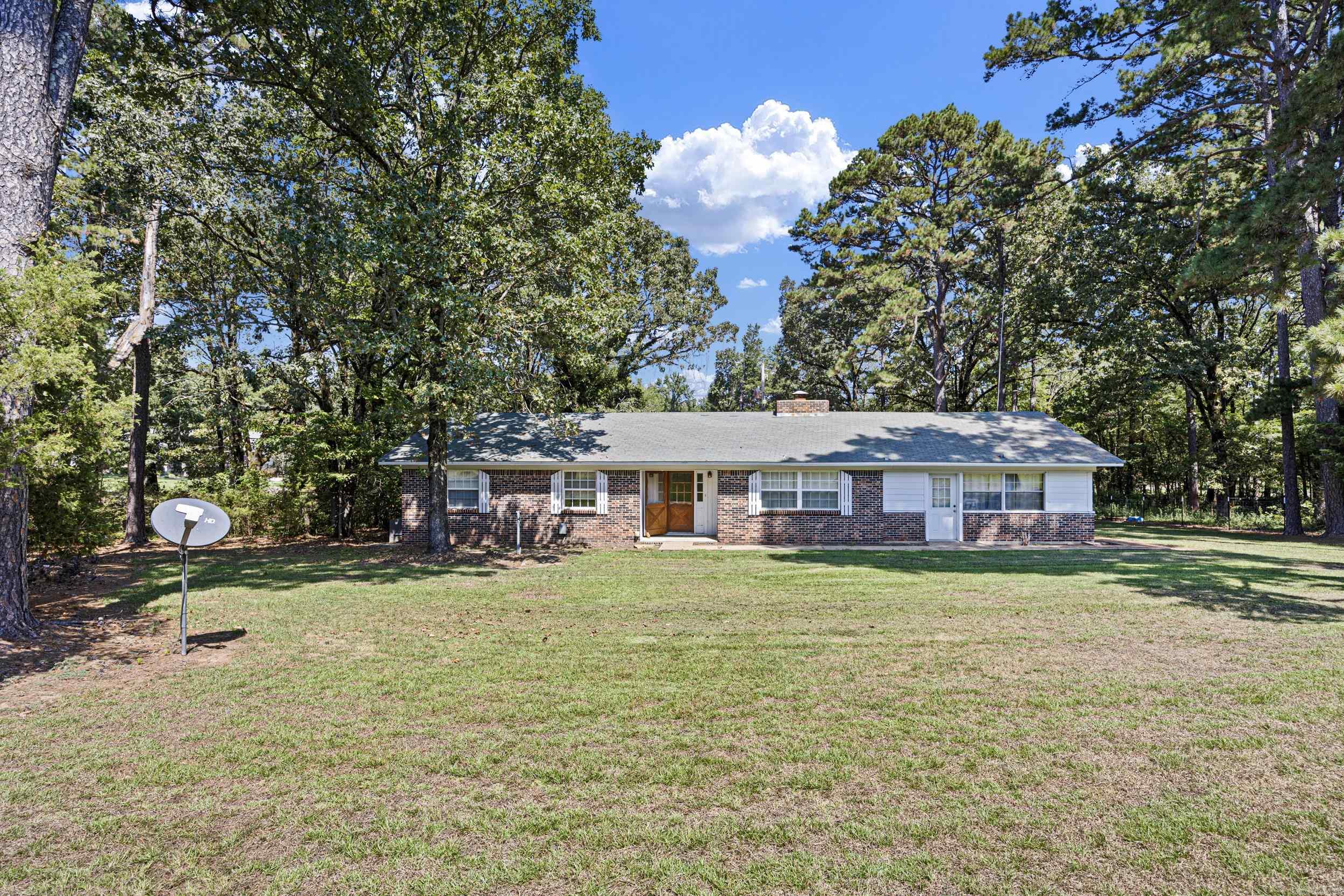 Home Close to Town and Recreation, Just Outside of Dardanelle, AR This well-kept 1,998 sq ft home sits on a quiet, private lot just minutes from town. With a brand new HVAC system and hot water heater, it’s move-in ready and built for comfort and reliability. Inside, you'll find updated LED lighting throughout, giving the home a clean, modern feel. The layout offers plenty of space for everyday living or entertaining. Out back, there's a large open yard perfect for gatherings, gardening, or relaxing outdoors. A separate fenced-in area is already set up—ideal for small livestock, dogs, or hobby animals. The property also includes a detached carport and plenty of space for projects, toys, or tools. If you're looking for a well-built, reasonably priced home with room to spread out—while still being close to town—this Dardanelle property is one you do not want to miss!