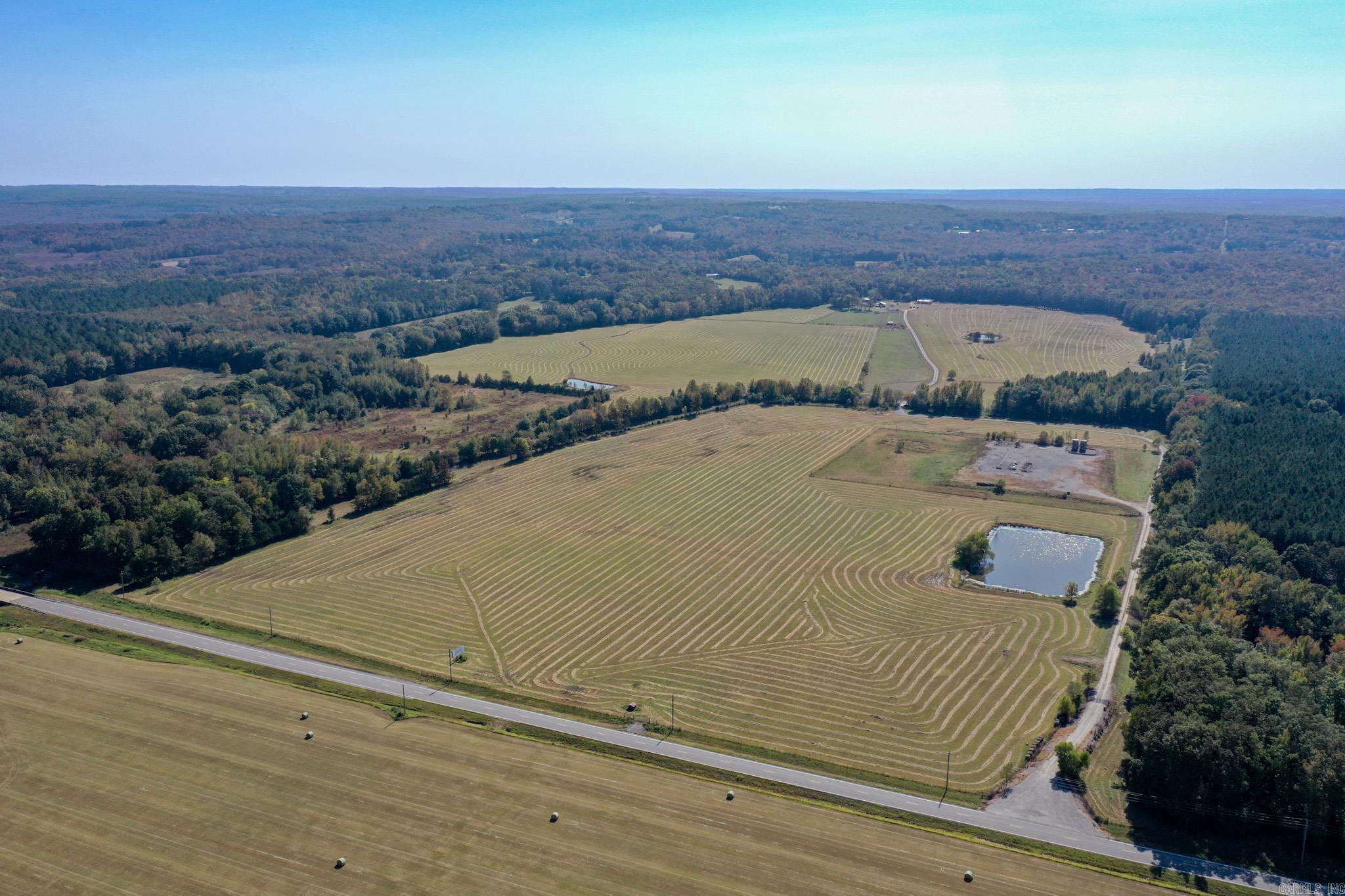 Check out the views! This 160 acre +/- property located near the Little Red River is currently being used as a successful cattle farm. Continue operations, or turn this into your dream homestead! New 3/4 mile long gravel driveway will take you to the perfect building sight on the back of the property where new water and electrical lines have been ran! Tiny home, tractor, and equipment are also available with an acceptable offer.