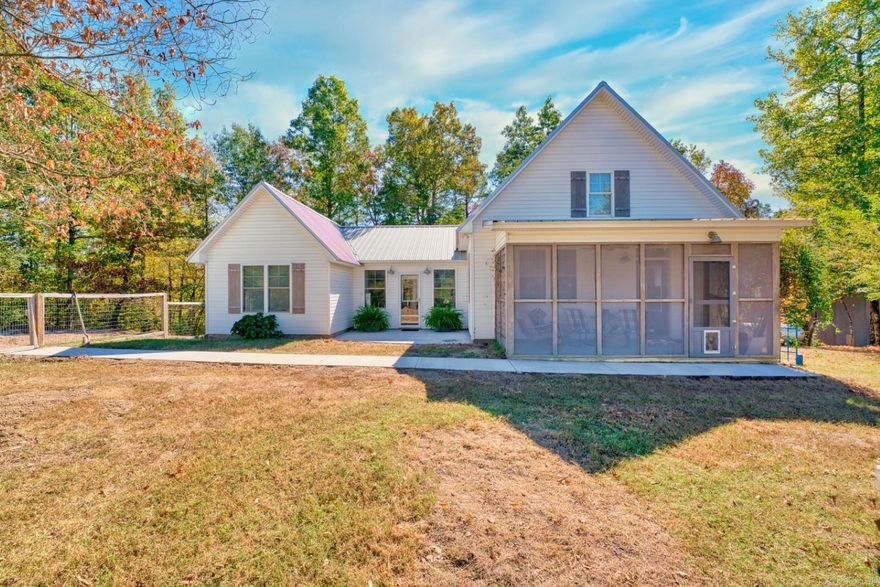 Charming Modern Farmhouse on Acreage with Creek Frontage and Guest Apartment!!  Built in 2017, this beautifully designed 3-bedroom, 3-bathroom farmhouse offers 1,518 sq ft of comfortable living space, perfectly positioned to overlook the scenic property. The southern boundary is graced by the tranquil Little Mazarn Creek, adding natural charm and privacy.  Situated on 5 acres, with the option to expand up to approximately 27 acres, this property is ideal for those seeking space, serenity, and flexibility. The home features modern conveniences including a propane-powered generator, zoned HVAC system, and a tankless water heater for energy efficiency.  A standout feature is the separate 900 sq ft shop building, which includes a fully equipped 600 sq ft, 1-bedroom, 1-bath apartment complete with its own laundry—perfect for guests, extended family, or rental income.