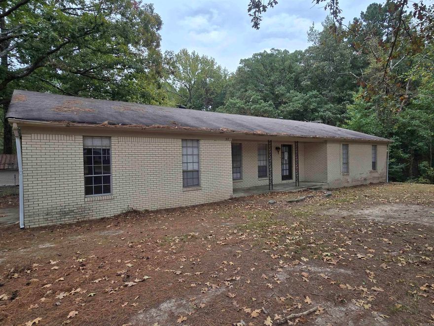 Charming 3 bedroom, 2 bath brick home situated on approximately 3.92 acres in Redfield! This property offers the perfect blend of country living with convenient access to town. Inside you’ll find a comfortable layout with central heat and air and a spacious living area. Outside, enjoy two outbuildings for additional storage along with plenty of open space—ideal for outdoor activities, a garden, or future improvements. If you’ve been looking for a home on acreage in the Redfield area, this one deserves a look!  AGENTS SEE REMARKS