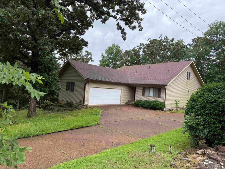 NEED OVERFLOW SPACE WHEN ALL OF THE FAMILY COMES?  Or space for crafts or office or studio?  This one may be just what you are looking for!!!  The custom designed 2 levels offer areas to accommodate your activities for easy, daily living, plus room to spread out as needed.  The main level has everything for day-to-day needs: easy entry, mud room from large garage, breakfast room (built-in desk & nice storage) with kitchen, large sunroom, a spacious living-dining area with a fireplace, and your main bedroom & bathroom.  Then upstairs provides another BR & Bath, plus a loft to use as extra den, sleeping area, office, crafts, other hobbies, workout, or whatever you may need space for!!.  Quality features throughout including Corian kitchen counters, LVP flooring & carpet, showers/tubs with tile surround, extra storage.  Oversized garage for 2 vehicles, mowers, storage & shop space. Great deck too! Plus a detached building for other yard tools, etc.  Crawlspace was encapsulated by Terminix, plus dehumidifier.  Roof 11-12 yrs old, with Leafless gutters.  Seller is offering a 1-yr warranty to Buyer. This is a MUST SEE property at a great price!!  It's a real gem.