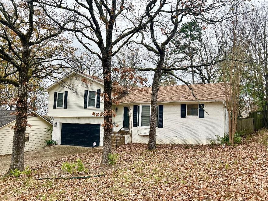 Beautifully updated 3 bed, 2 bath home in West LR neighborhood. Spacious floor plan and is move in ready.   The kitchen features new granite countertops with new stainless stove and dishwasher. Bathrooms updated with new vanities and custom tile showers. Large spacious deck for entertaining, surrounded by wooden privacy fence. Gas log fireplace. LED lighting. Security system. Garage revamped with new door, opener, and new floor coating. Spray foam encapsulated crawl space for efficiency.