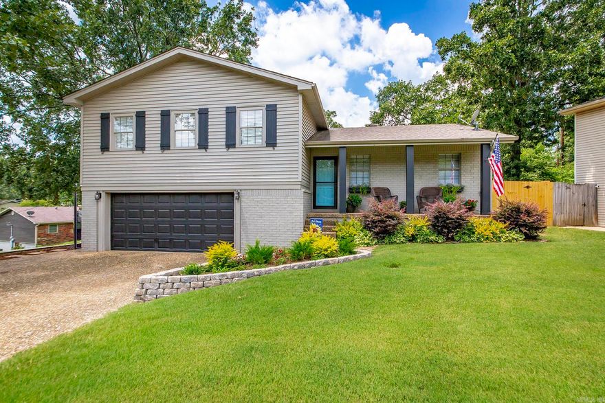 Welcome to 6501 Rustic Lane – where comfort meets style on a desirable corner lot in a quiet, established neighborhood. This beautifully updated home offers 4 bedrooms, 2.5 bathrooms, and two separate living areas, perfect for both everyday living and entertaining. You’ll love the cozy fireplace with gas logs, gorgeous hardwood floors, and classic crown molding throughout. The remodeled kitchen features granite countertops, soft-close cabinetry, gold hardware finishes, and an open layout that flows into the living and dining spaces. Step outside to a screened-in porch and a newly sodded backyard, with yet another decked sitting area; ideal for relaxing or hosting guests. Enjoy the peace of mind that comes with a brand-new full crawl space encapsulation, remodeled bathrooms, and a durable architectural roof. Stylish, functional, and perfectly situated—this move-in-ready gem is ready to welcome you home! Agents: See Remarks!